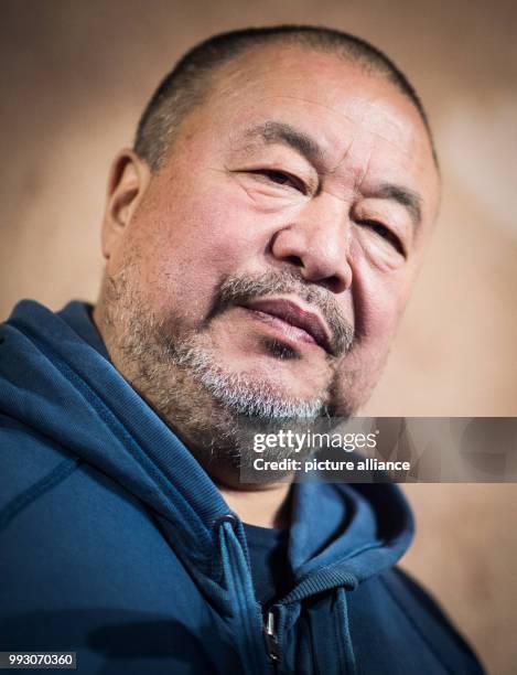 Chinese artist Ai Weiwei arrives at the Germany premiere of his movie 'Human Flow' in Berlin, Germany, 7 November 2017. The movie can be seen in...