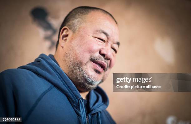 Chinese artist Ai Weiwei arrives at the Germany premiere of his movie 'Human Flow' in Berlin, Germany, 7 November 2017. The movie can be seen in...