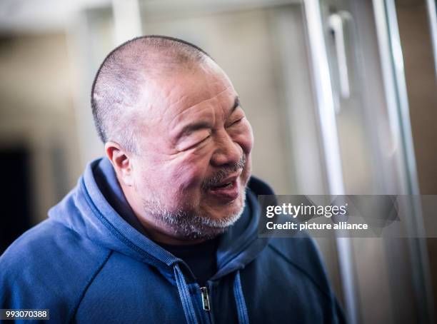 Chinese artist Ai Weiwei arrives at the Germany premiere of his movie 'Human Flow' in Berlin, Germany, 7 November 2017. The movie can be seen in...