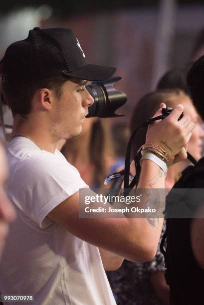 Brooklyn Beckham watches J.Cole perform on Day 1 of Wireless Festival 2018 at Finsbury Park on July 6, 2018 in London, England.