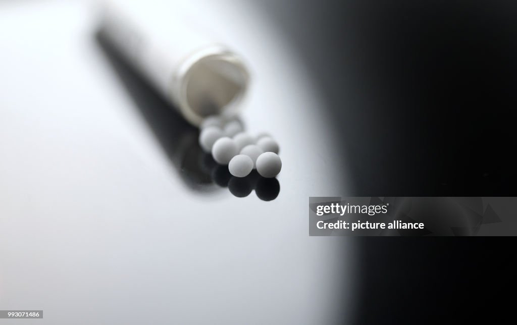 Homeopathic globules