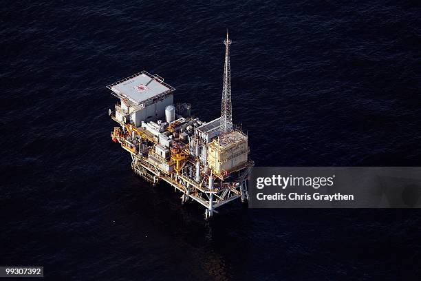 Oil platforms sit in the Gulf of Mexico near the Louisiana coast line on April 28, 2010.