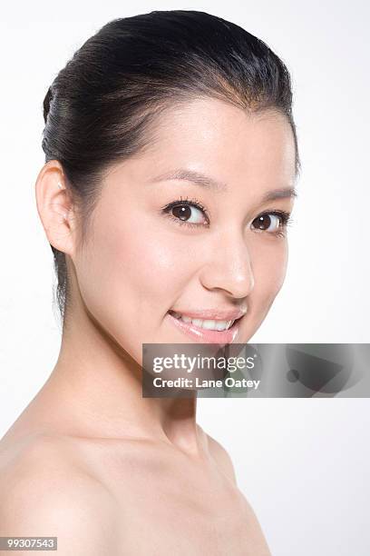 beauty shot of a young woman - natural portrait studio shot white background stock-fotos und bilder