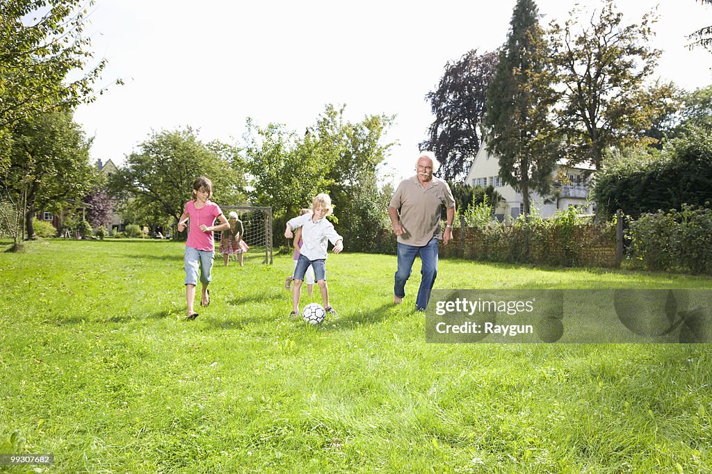 Playing football with the grandparents