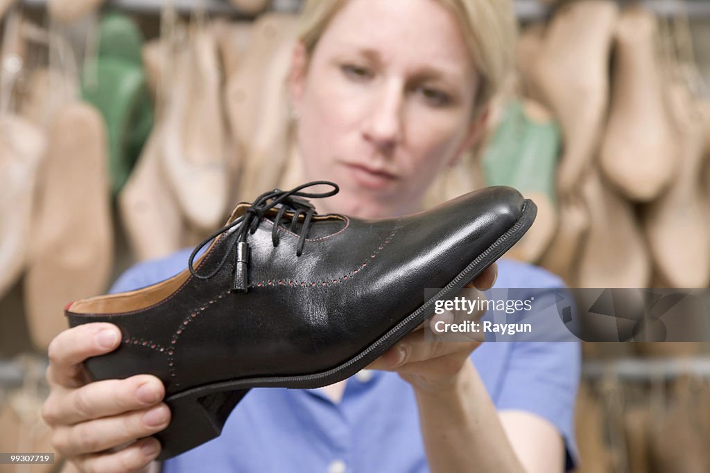 Shoemaker checking her work