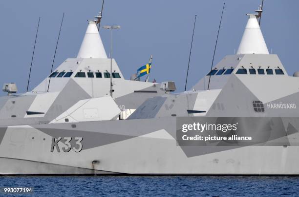 The two Swedish stealth corvettes, "Harnosand" and "Karlstad", lying at anchor in the Naval shipyard in Kiel, Germany, 08 November 2017. A squadron...