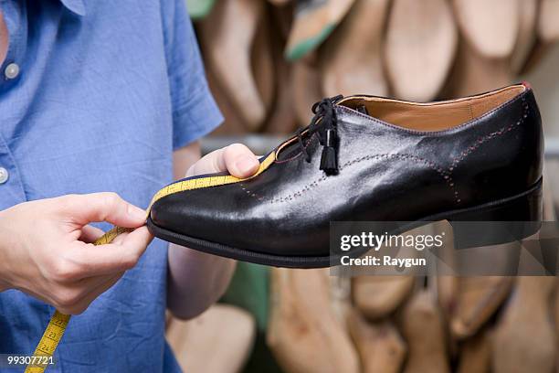 measuring the result of the effort - eleganter schuh stock-fotos und bilder