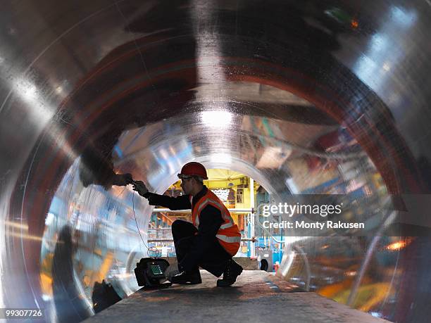 engineer testing forged steel - sheffield steel stock pictures, royalty-free photos & images