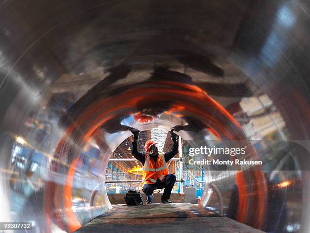 engineer testing forged steel - manufacturing machinery stock pictures, royalty-free photos & images