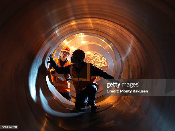 engineers inspecting forged steel - steel production imagens e fotografias de stock