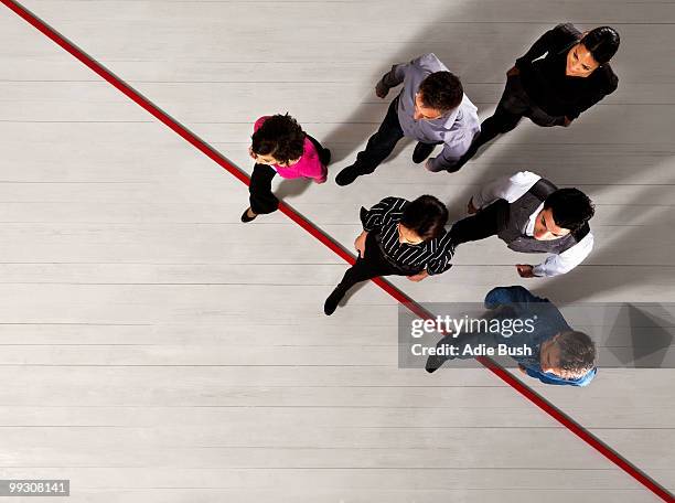 business people crossing a red line - initiative stock pictures, royalty-free photos & images