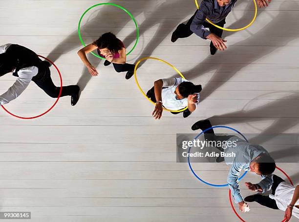 men and women with hula hoops - bush live stockfoto's en -beelden