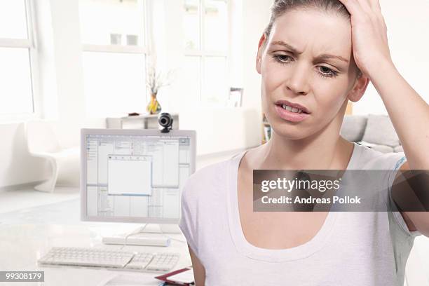 woman in home office - overdoing stock pictures, royalty-free photos & images