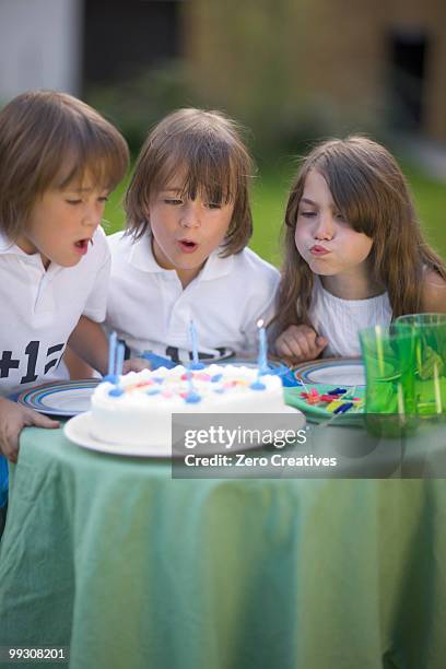 twins celebrating their birthday - zero effort stock pictures, royalty-free photos & images