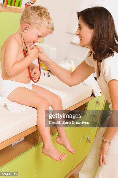 children at the pediatrician - starnberg stock pictures, royalty-free photos & images