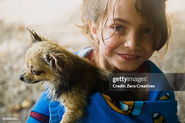 girl and little dog - wolfratshausen stock-fotos und bilder