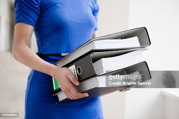 woman with files - brigitte sporrer stock pictures, royalty-free photos & images