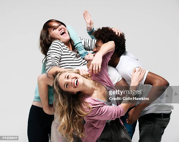 interconnected group of young adults - friends prank stock pictures, royalty-free photos & images