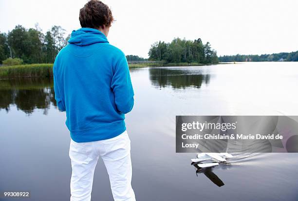 man playing with an rc plane - ghislain marie david de lossy stock pictures, royalty-free photos & images