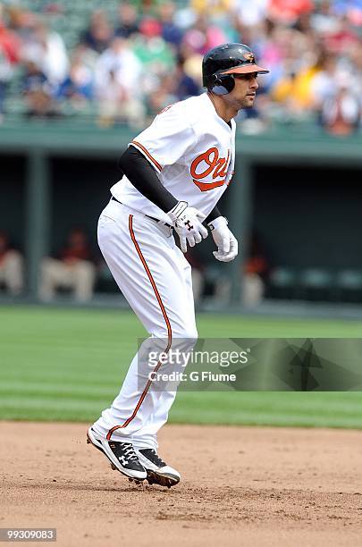 Nick Markakis of the Baltimore Orioles takes a lead off of second base against the Seattle Mariners at Camden Yards on May 13, 2010 in Baltimore,...