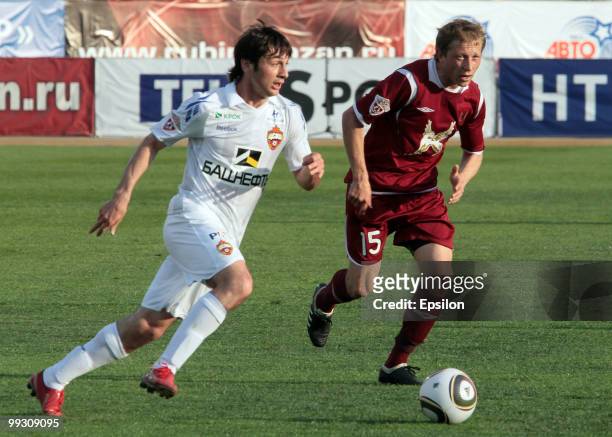 Rafal Murawski of FC Rubin Kazan battles for the ball with Alan Dzagoev of PFC CSKA Moscow in action during the Russian Football League Championship...