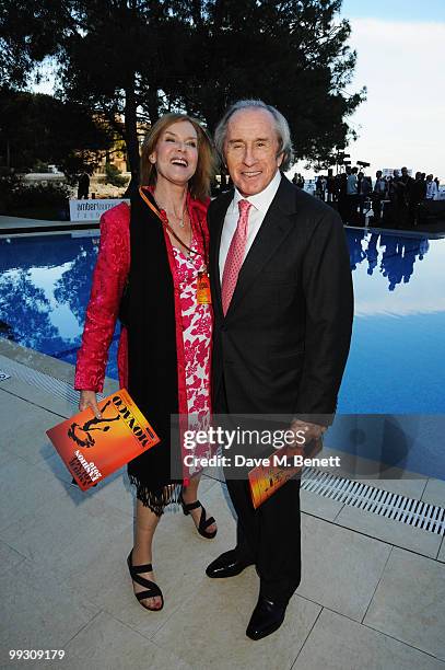 Sir Jackie Stewart and his wife Helen attend the Amber Fashion Show and Auction held at the Meridien Beach Plaza on May 14, 2010 in Monte Carlo,...