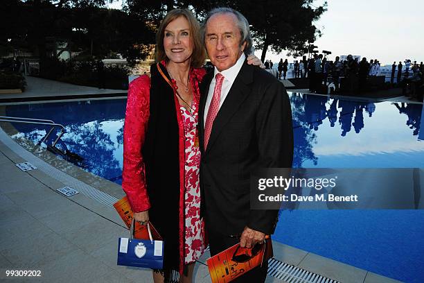 Sir Jackie Stewart and his wife Helen attend the Amber Fashion Show and Auction held at the Meridien Beach Plaza on May 14, 2010 in Monte Carlo,...