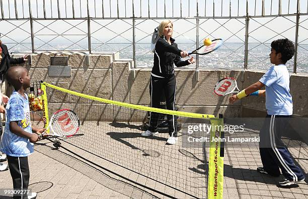 Donovan, Chris Evert and Zuhri celebrate National Tennis Month at The Empire State Building on May 13, 2010 in New York City.