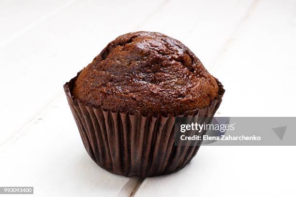 chocolate muffins background - cupcake holder stock pictures, royalty-free photos & images