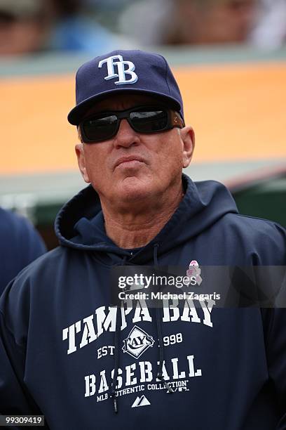 Manager Joe Maddon of the Tampa Bay Rays standing in the dugout during the game against the Oakland Athletics at the Oakland Coliseum on May 9, 2010...