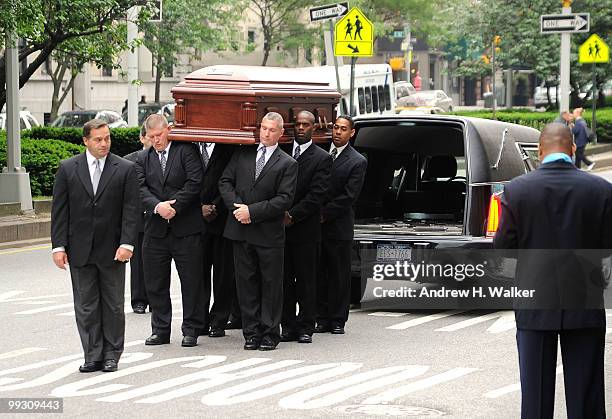 Pallbearers carry the casket of entertainer Lena Horne at St. Ignatius Loyola Church on May 14, 2010 in New York City.