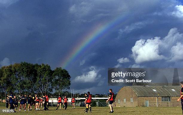 The Wallabies practice under a rainbow during the Australian Wallabies training session at Randwick Army Barracks in preparation for the third test...
