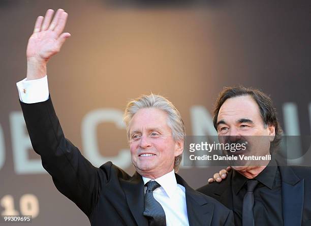 Actor Michael Douglas and director Oliver Stone attend the Premiere of 'Wall Street: Money Never Sleeps' held at the Palais des Festivals during the...