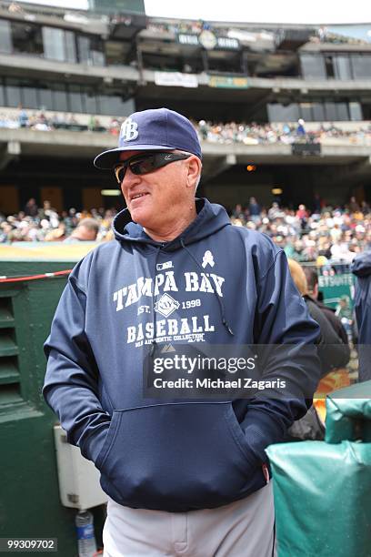 Manager Joe Maddon of the Tampa Bay Rays standing in the dugout prior to the game against the Oakland Athletics at the Oakland Coliseum on May 9,...