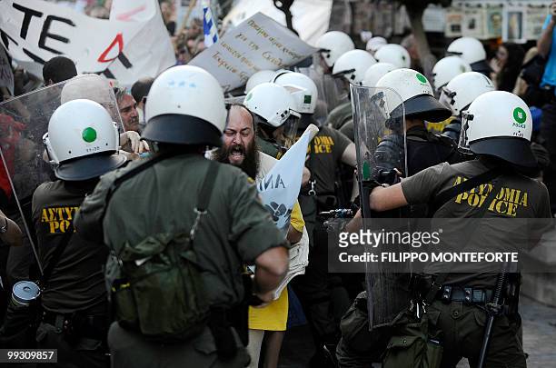 Kurdish and Armenian protestors clash with Greek police in central Athens during a demonstration against Turkish Prime Minister Recep Tayyip Erdogan...