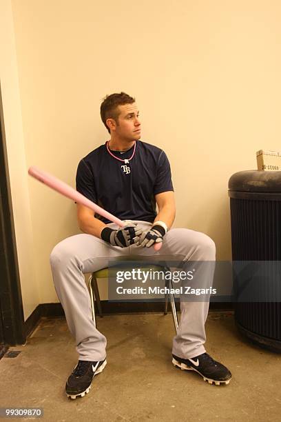 Evan Longoria of the Tampa Bay Rays sitting in the indoor batting cages prior to the game against the Oakland Athletics at the Oakland Coliseum on...