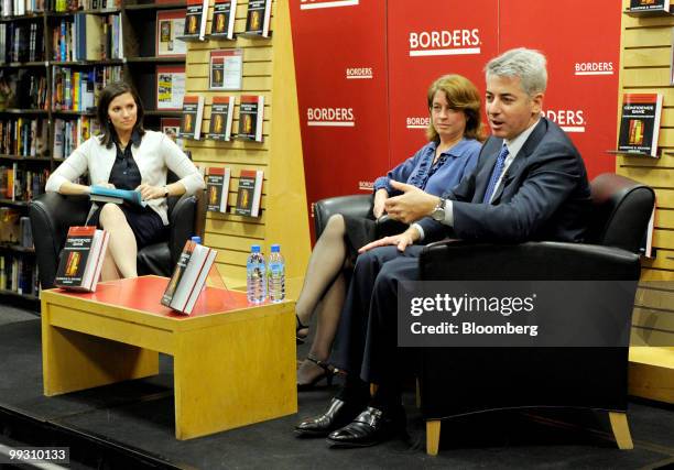 William "Bill" Ackman, founder and chief executive officer of Pershing Square Capital Management LP, right, speaks with author Christine Richard,...