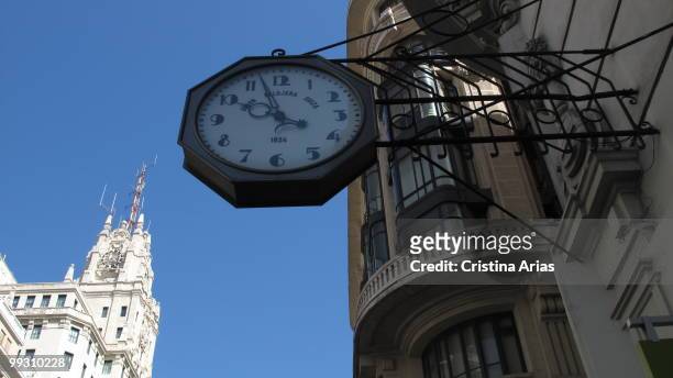 Traditional clock of Union Relojera Suiza in Gran Via Street, Madrid, april 2010
