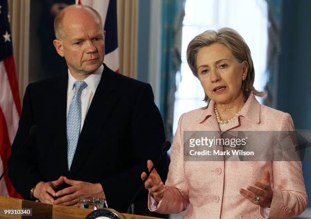 Secretary of State Hillary Clinton and British Foreign Minister William Hague speak to reporters during a news conference at the State Department on...