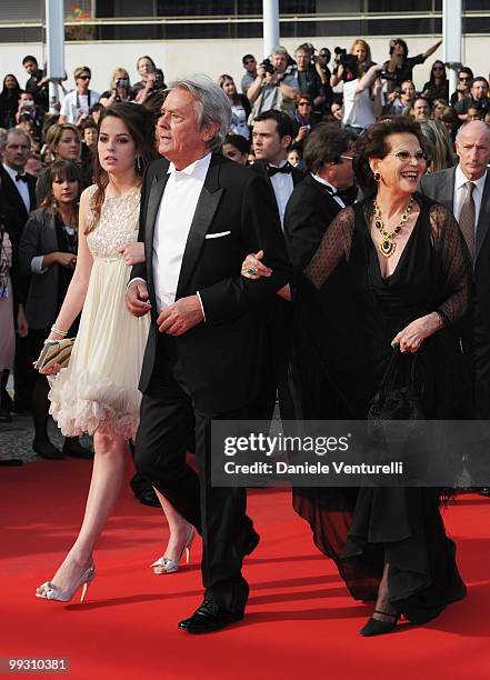 Anouchka Delon, actor Alain Delon and actress Claudia Cardinale attend the 'Il Gattopardo' premiere held at the Palais des Festivals during the 63rd...