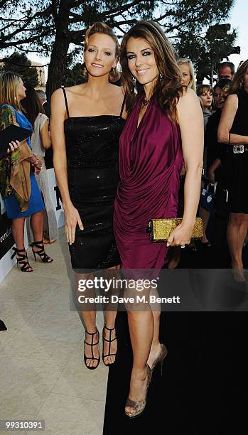 Actress Liz Hurley and Charlene Wittstock, girlfriend of Prince Albert II of Monaco attend the Amber Fashion Show and Auction held at the Meridien...