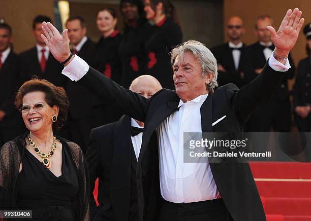 Actress Claudia Cardinale and actor Alain Delon attend the 'Il Gattopardo' premiere held at the Palais des Festivals during the 63rd Annual...