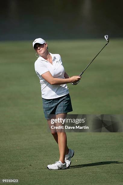 Amanda Blumenherst watches her approach shot to the 18th green during second round play in the Bell Micro LPGA Classic at the Magnolia Grove Golf...