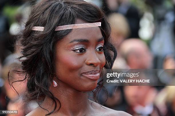 French actress Aissa Maiga arrives for the screening of "Il Gattopardpo" presented during a special screening at the 63rd Cannes Film Festival on May...