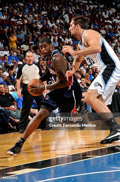 Marvin Williams of the Atlanta Hawks drives to the basket against Ryan Anderson of the Orlando Magic in Game One of the Eastern Conference Semifinals...