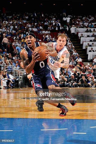Jeff Teague of the Atlanta Hawks drives to the basket past Jason Williams of the Orlando Magic in Game One of the Eastern Conference Semifinals...
