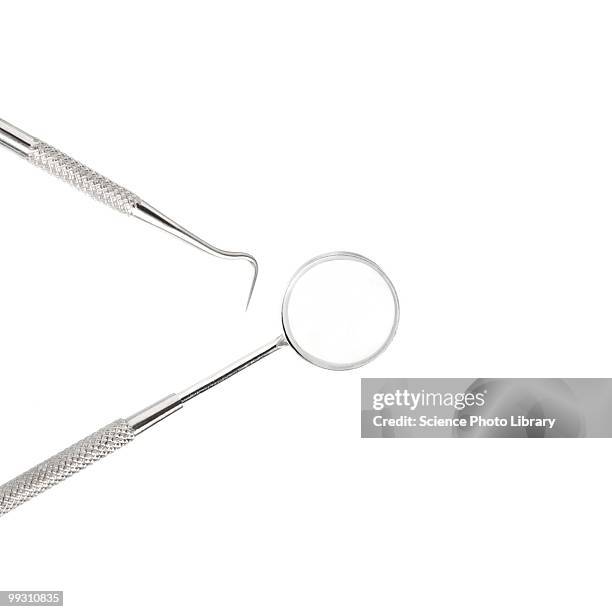 dental instruments - espejo dental fotografías e imágenes de stock