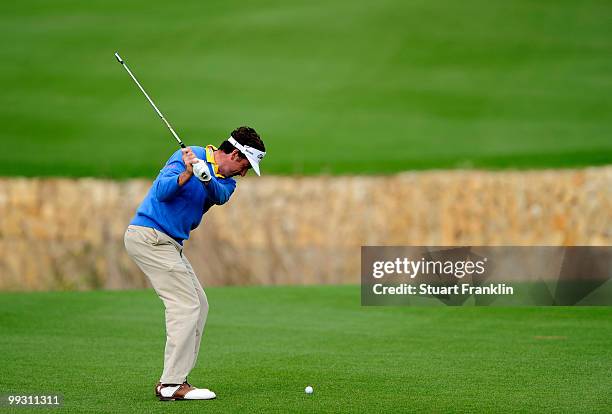 Gonzalo Fernandez - Castano of Spain plays his approach shot on the sixth hole during the second round of the Open Cala Millor Mallorca at Pula golf...