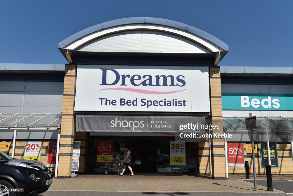 A general view of a Dreams the bed specialist and Sharps furniture