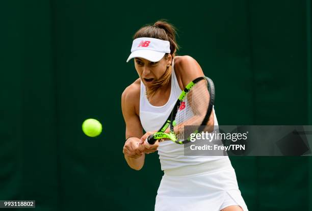 Sorana Cirstea of Romania in action against Evgeniya Rodina of Russia in the second round of the Ladies Singles at the All England Lawn Tennis and...